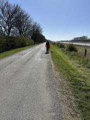 Heading down the road into Sutton Bridge, River Nene on the right